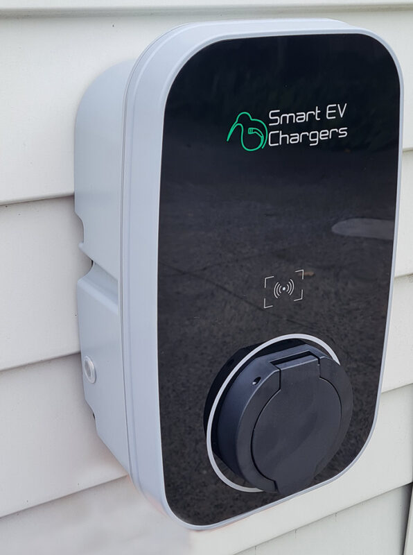 smart ev charger installed on the side of a building